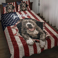 Pitbull quilt blanket styled on a bed with American flag stripes, stars, and realistic dog portraits