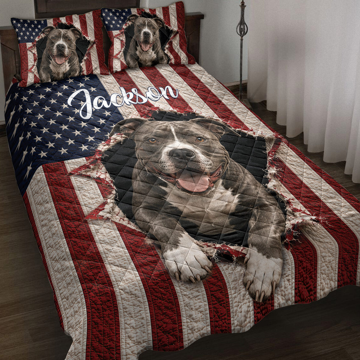 Pitbull quilt blanket styled on a bed with American flag stripes, stars, and realistic dog portraits