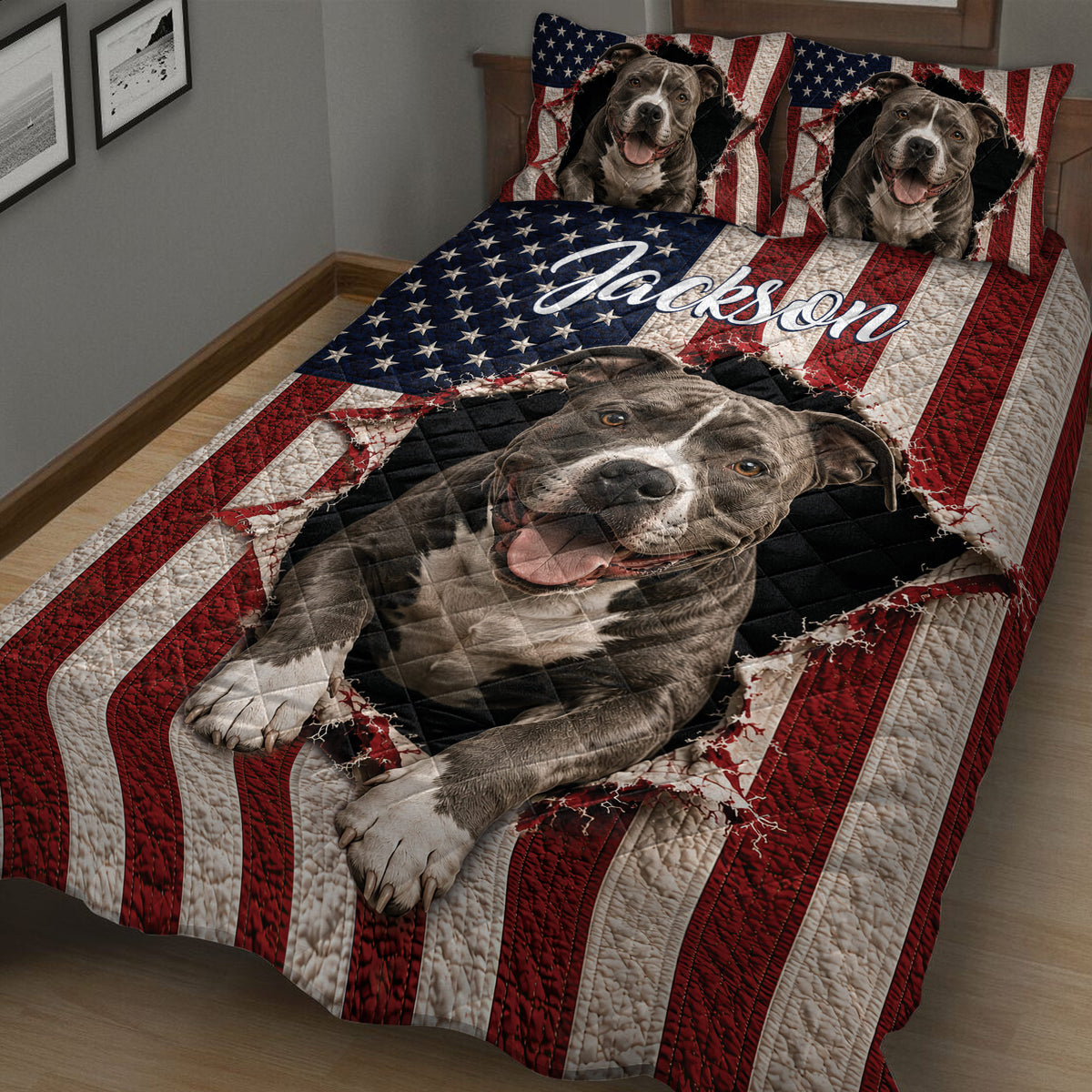 Angled bedroom view of a red, white, and blue pitbull quilt with large dog portrait artwork