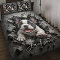 French Bulldog quilt blanket displayed on a bed with dramatic cracked concrete artwork and matching pillows