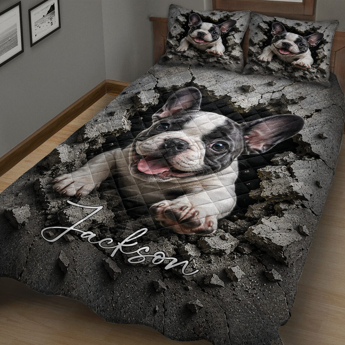 Close bedroom view of a French Bulldog quilt blanket with dark cracked stone artwork and matching pillows