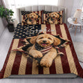 Goldendoodle quilt blanket styled on a bedroom bed with coordinating patriotic pillow artwork