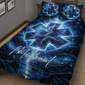 Angled bedroom view of a blue paramedic quilt blanket with illuminated medical emblem design