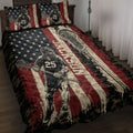 Lacrosse quilt blanket spread across a bed with patriotic flag artwork, players, sticks, and goal imagery