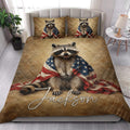 Raccoon quilt bedding styled in a bright bedroom with bold patriotic wildlife artwork