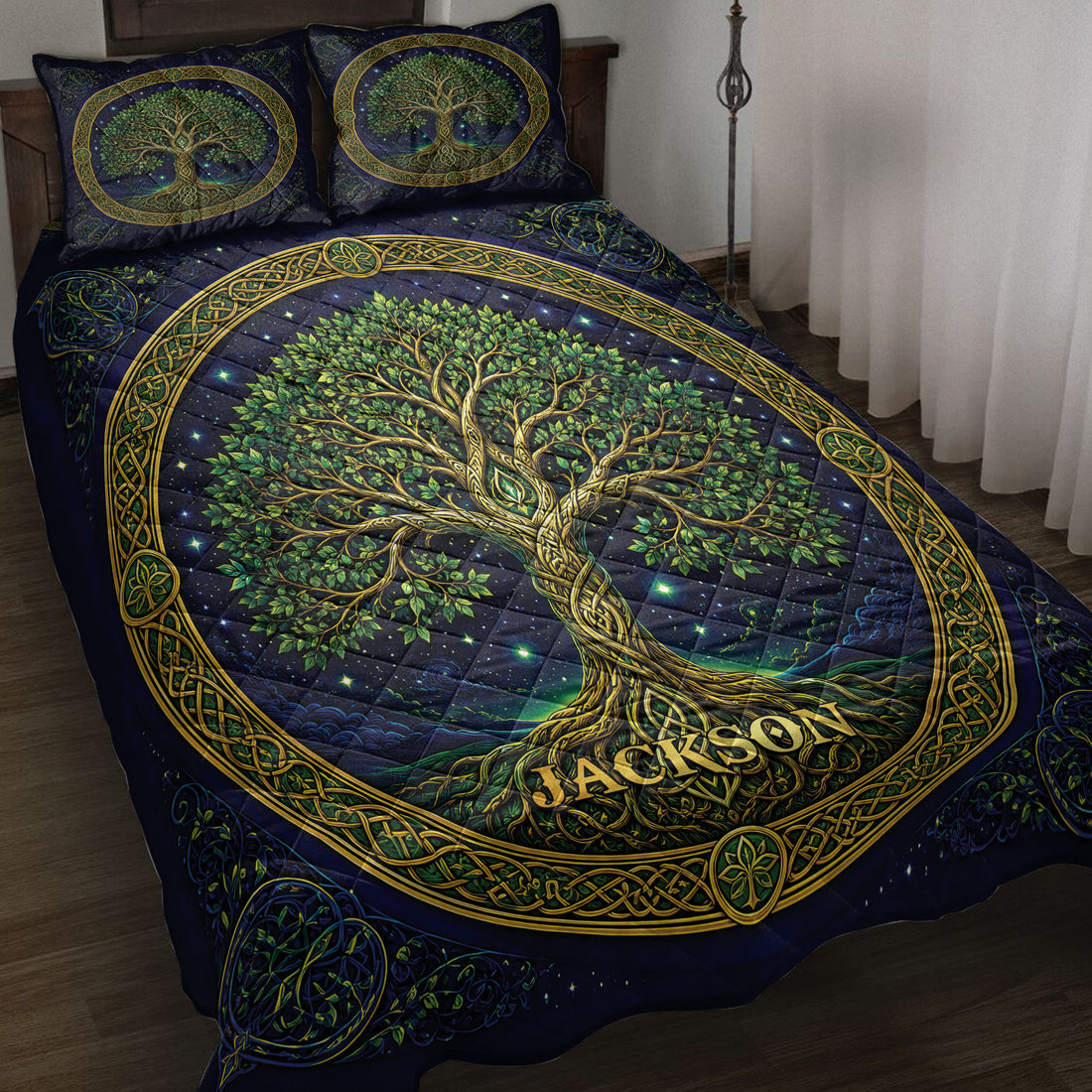 Tree Of Life quilt blanket displayed on a bed with green branches, golden roots, stars, and Celtic borders