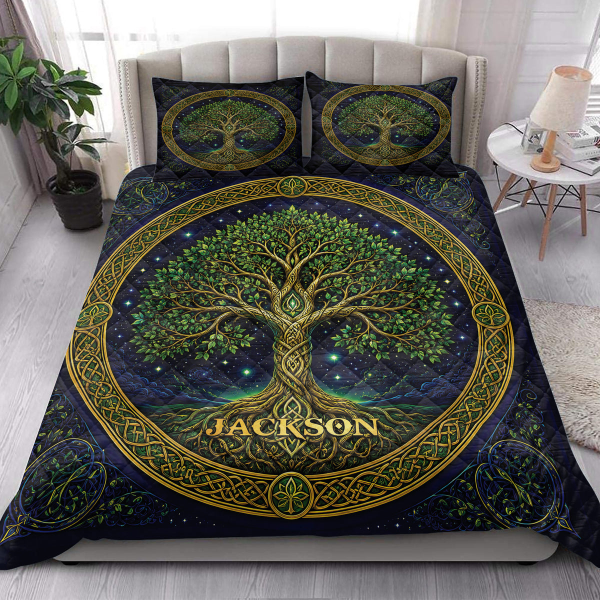 Tree Of Life quilt blanket styled in a bright bedroom with matching tree artwork across the bed