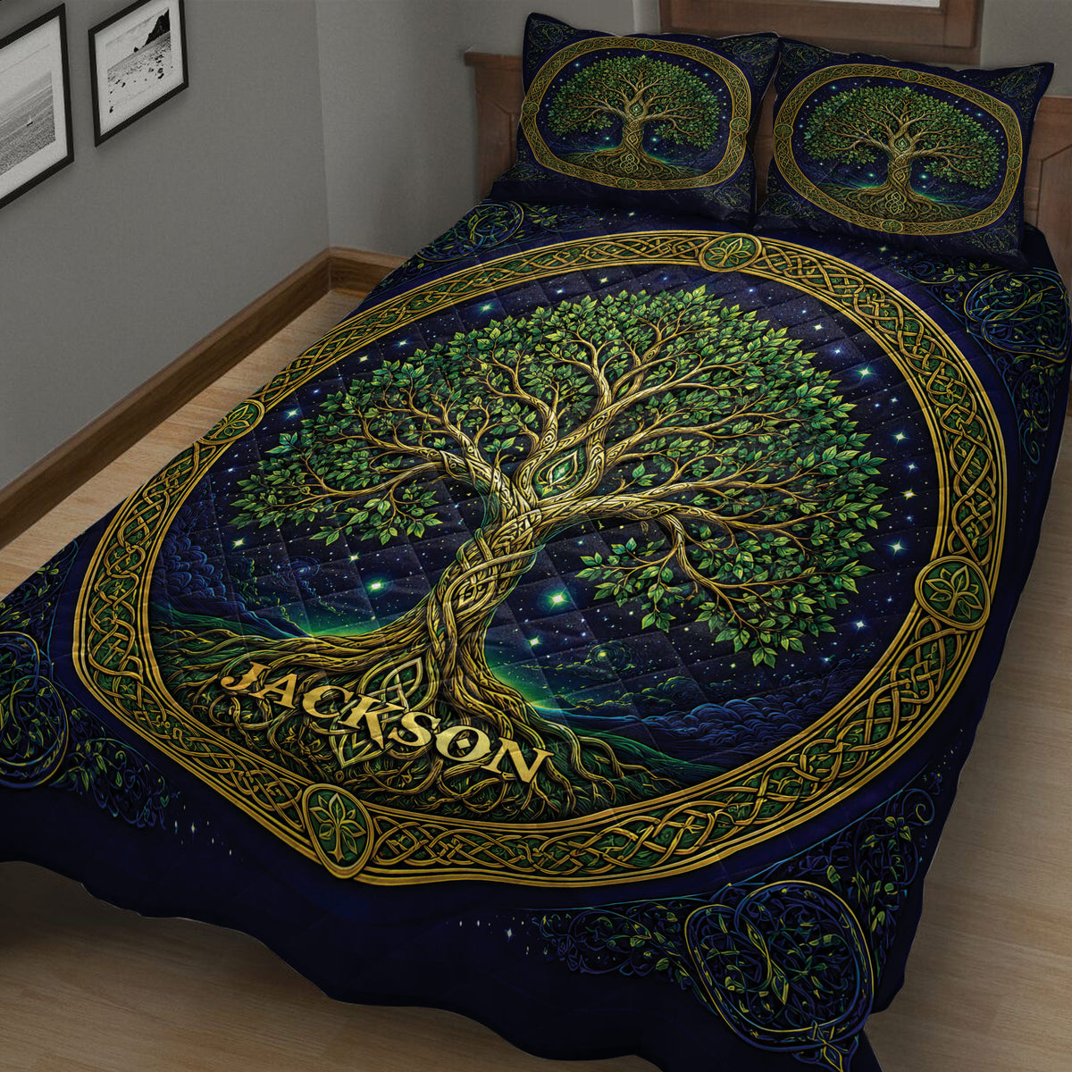 Close bedroom view of a Tree Of Life quilt blanket with green leaves, golden branches, and starry blue background