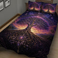Close view of Tree Of Life quilt blanket with glowing sunset, mountains and celestial details
