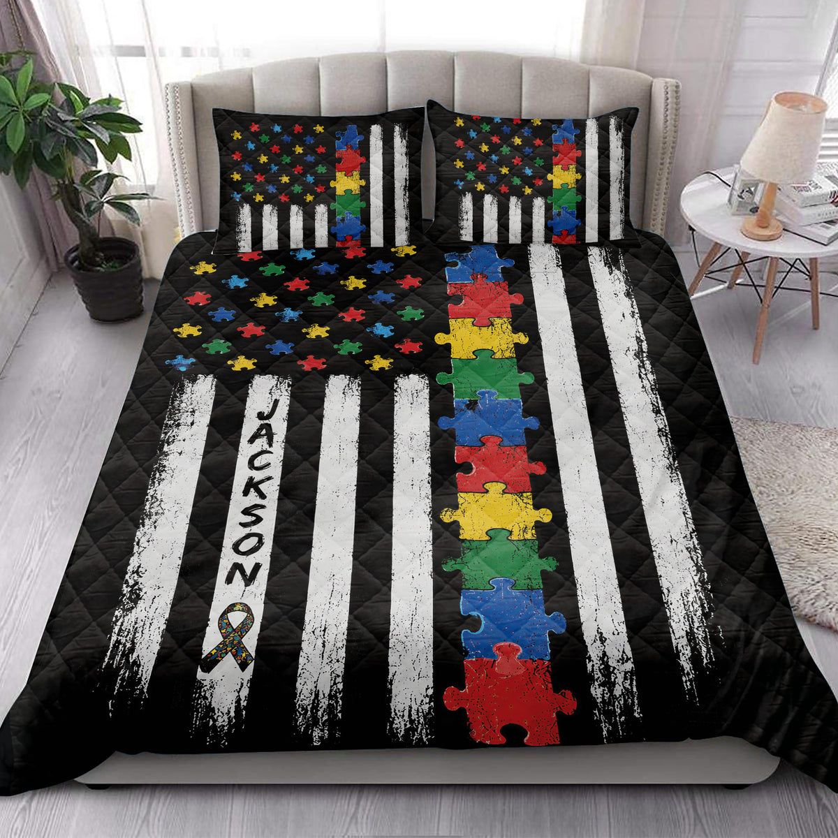 Autism quilt blanket styled in a bright bedroom with colorful puzzle pieces and awareness ribbon artwork