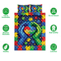 Autism quilt bedding set displayed with colorful puzzle pieces, heart artwork, and supportive hands