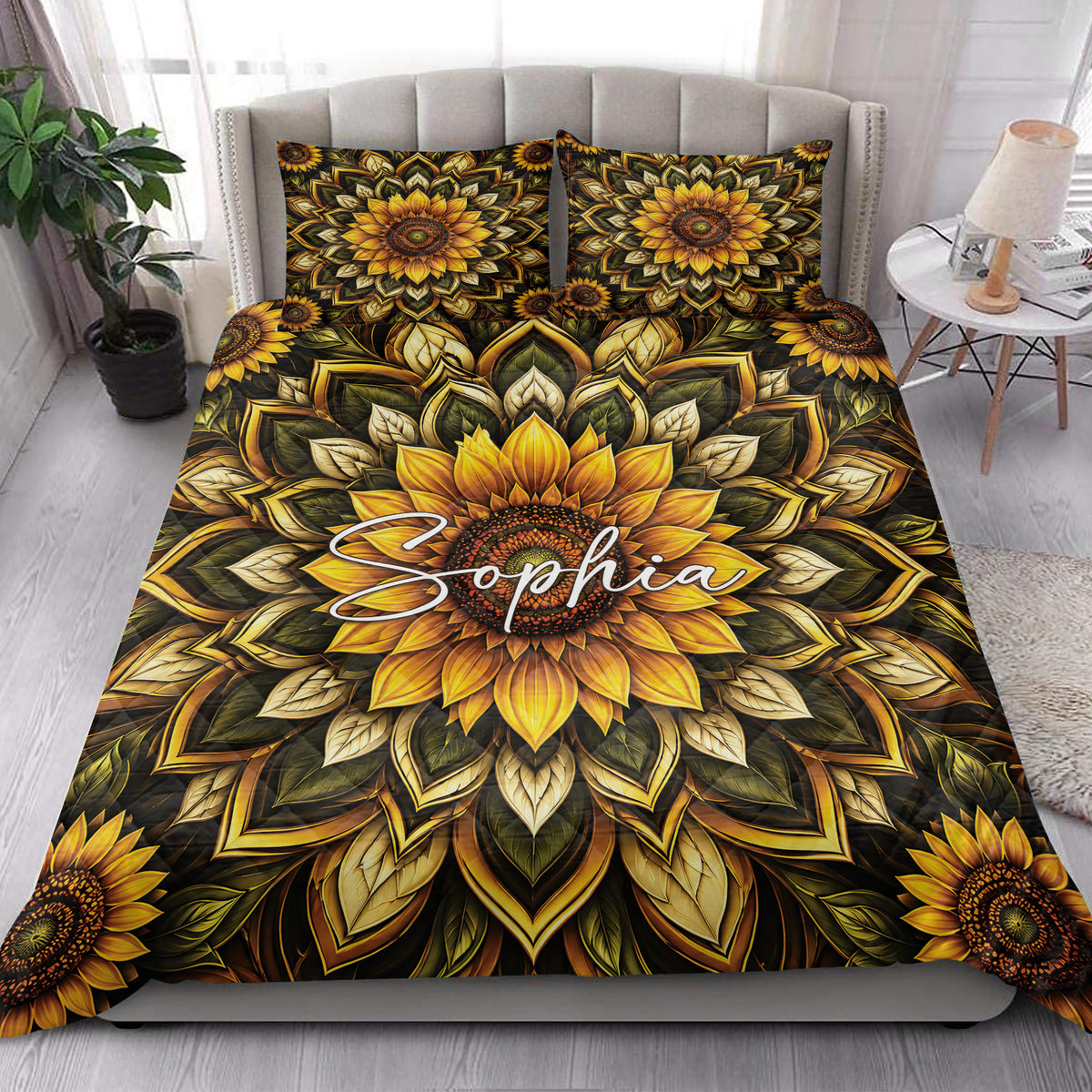 Sunflower quilt bedding styled in a bright bedroom with coordinated floral artwork across the bed
