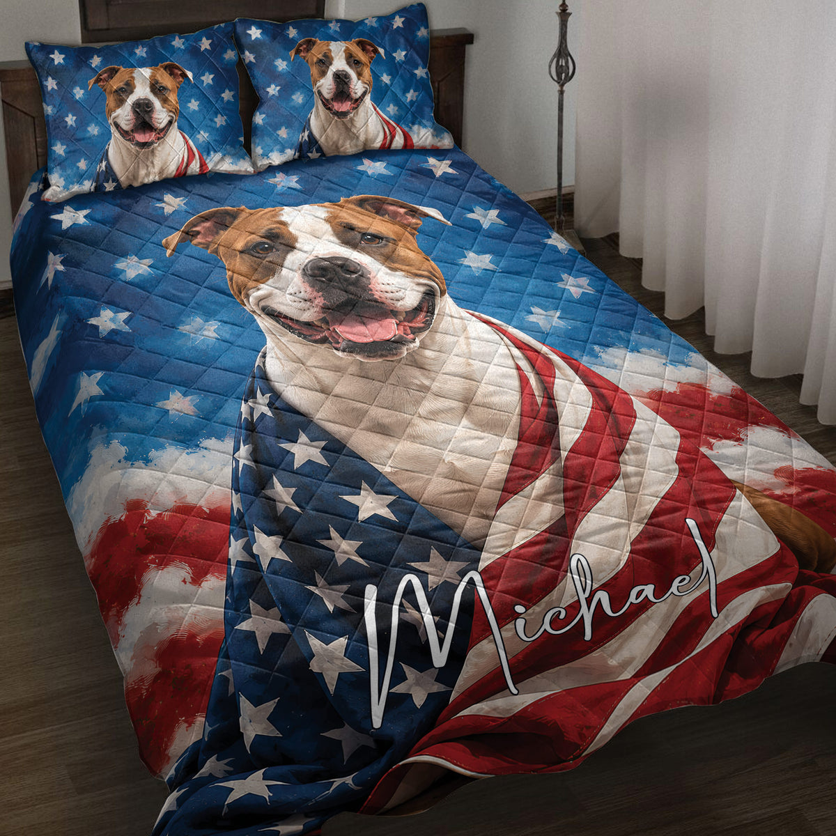 American Staffordshire dog quilt blanket displayed on a bed with patriotic stars and red, white, and blue artwork