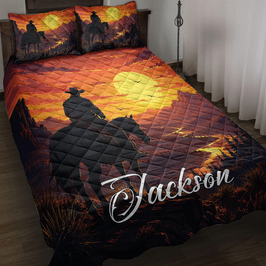 Cowboy quilt blanket displayed on a bed with horseback rider silhouettes, sunset mountains, and western artwork