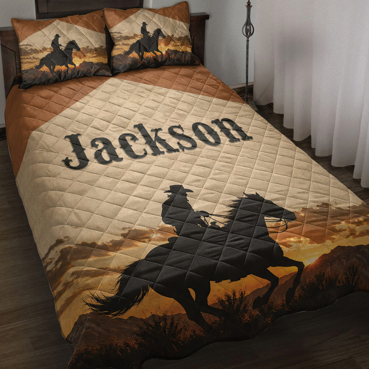 Cowboy quilt blanket displayed on a bed with horseback rider silhouettes, Western sunset scenery, and warm brown tones