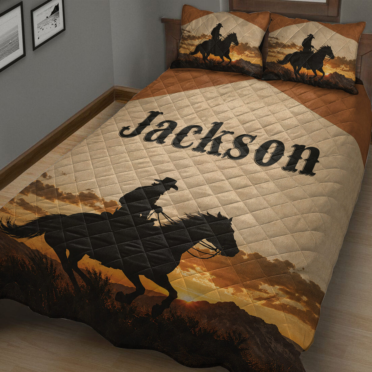 Close view of a Western cowboy quilt blanket featuring a horseback rider silhouette and golden desert sunset landscape
