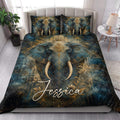 Elephant quilt blanket displayed on a bright bedroom bed with matching elephant artwork