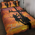 Lineman quilt blanket bedding set with utility worker silhouettes, power lines, and a vivid orange sunset design