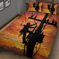 Close view of a lineman quilt blanket with utility pole silhouettes, climbing workers, power lines, and sunset colors