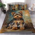 Yorkshire Terrier quilt blanket styled in a bright bedroom with coordinated dog artwork on the bed and pillows