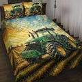 Tractor quilt blanket displayed on a bed with green farm tractor artwork and golden field scenery