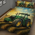 Close view of a tractor quilt blanket featuring a large green tractor in a harvested field