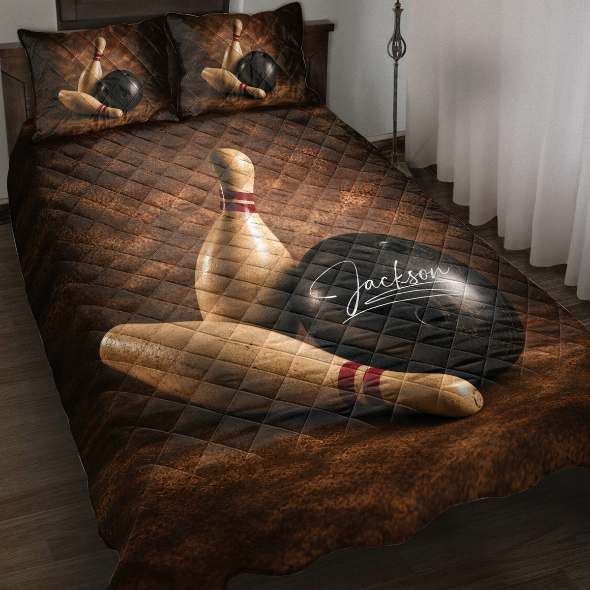 Bowling quilt blanket styled on a bed with bowling pins and black balls in warm brown artwork