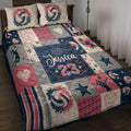 Volleyball quilt blanket displayed on a bed with red, navy, and gray sports artwork