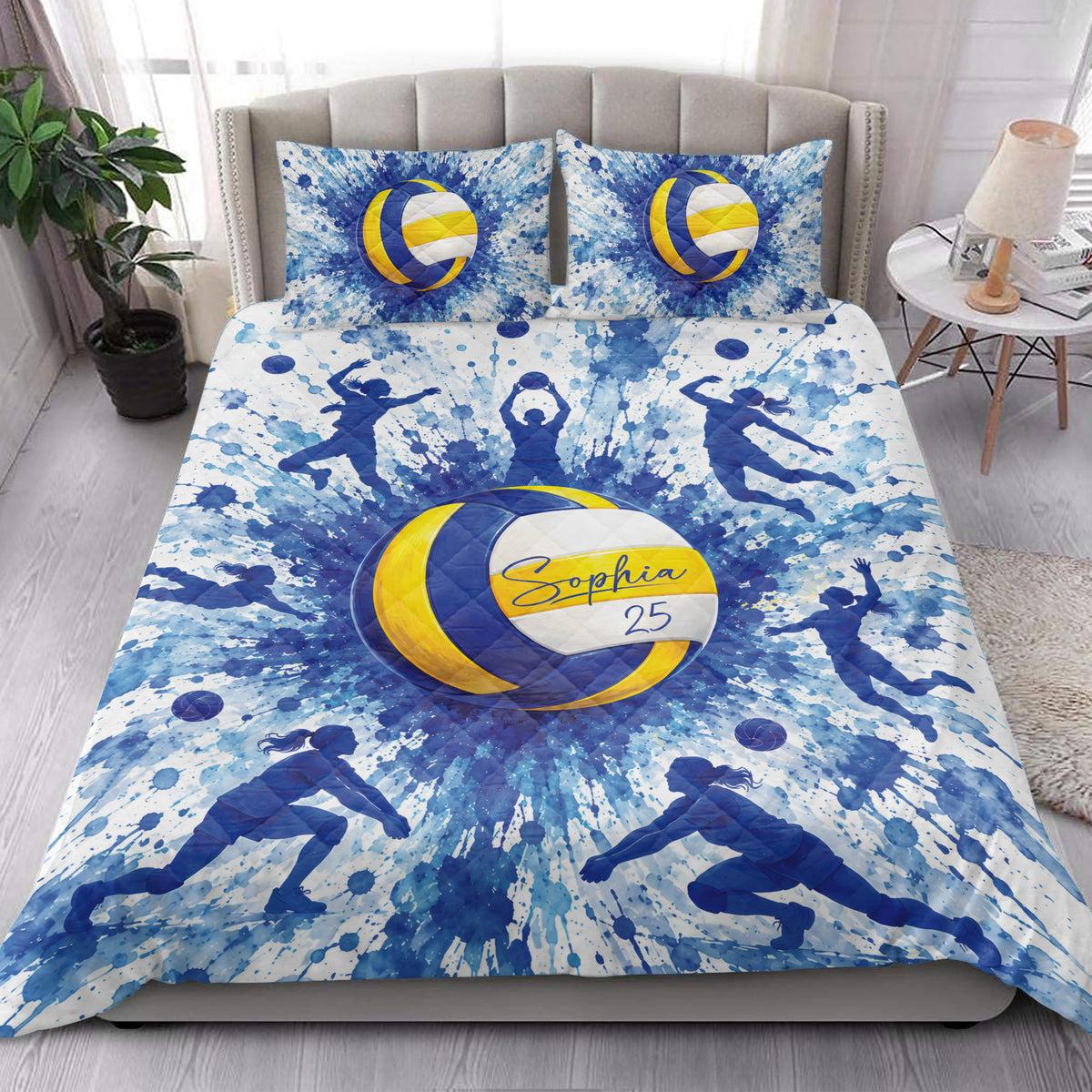 Volleyball quilt bedding styled in a bright bedroom with blue and yellow sports artwork
