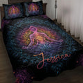 Yoga quilt bedding set displayed on a bed with colorful meditating figure and mandala artwork