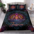 Yoga quilt bedding styled in a bright bedroom with colorful mandala and meditation artwork
