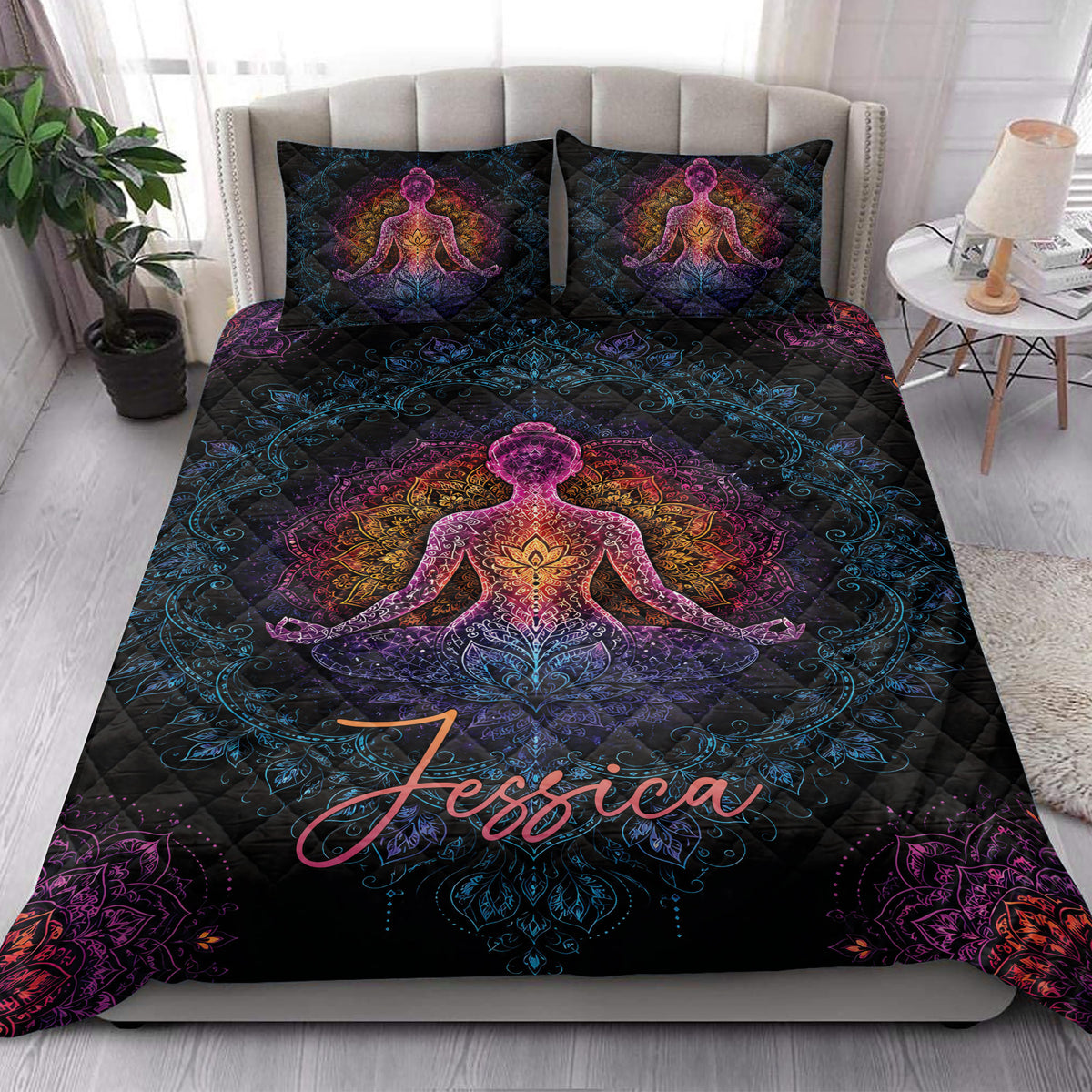 Yoga quilt bedding styled in a bright bedroom with colorful mandala and meditation artwork