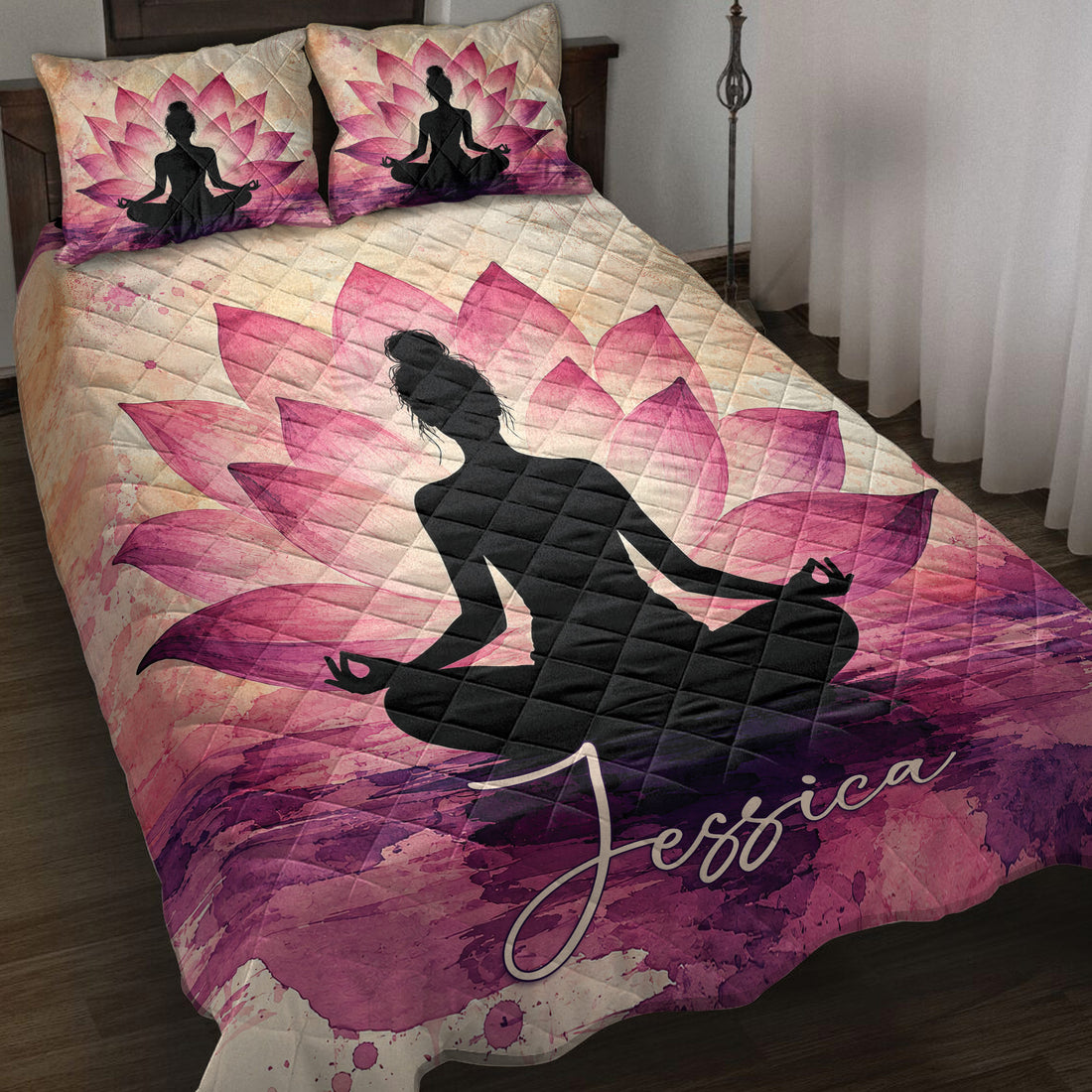 Yoga meditation quilt bedding set displayed on a bed with pink lotus flowers and a peaceful seated silhouette