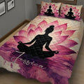 Close bedroom view of a yoga quilt blanket featuring a meditating silhouette and vibrant pink lotus artwork