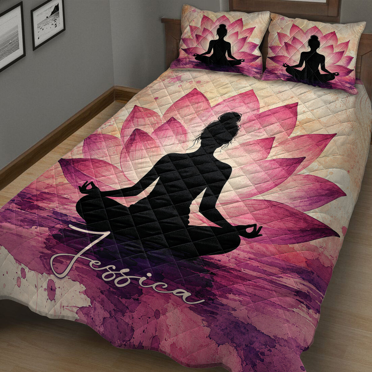 Close bedroom view of a yoga quilt blanket featuring a meditating silhouette and vibrant pink lotus artwork
