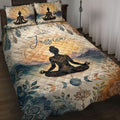 Yoga quilt bedding set displayed on a bed with meditating silhouette, mandala, mountains, feathers, and moon phases