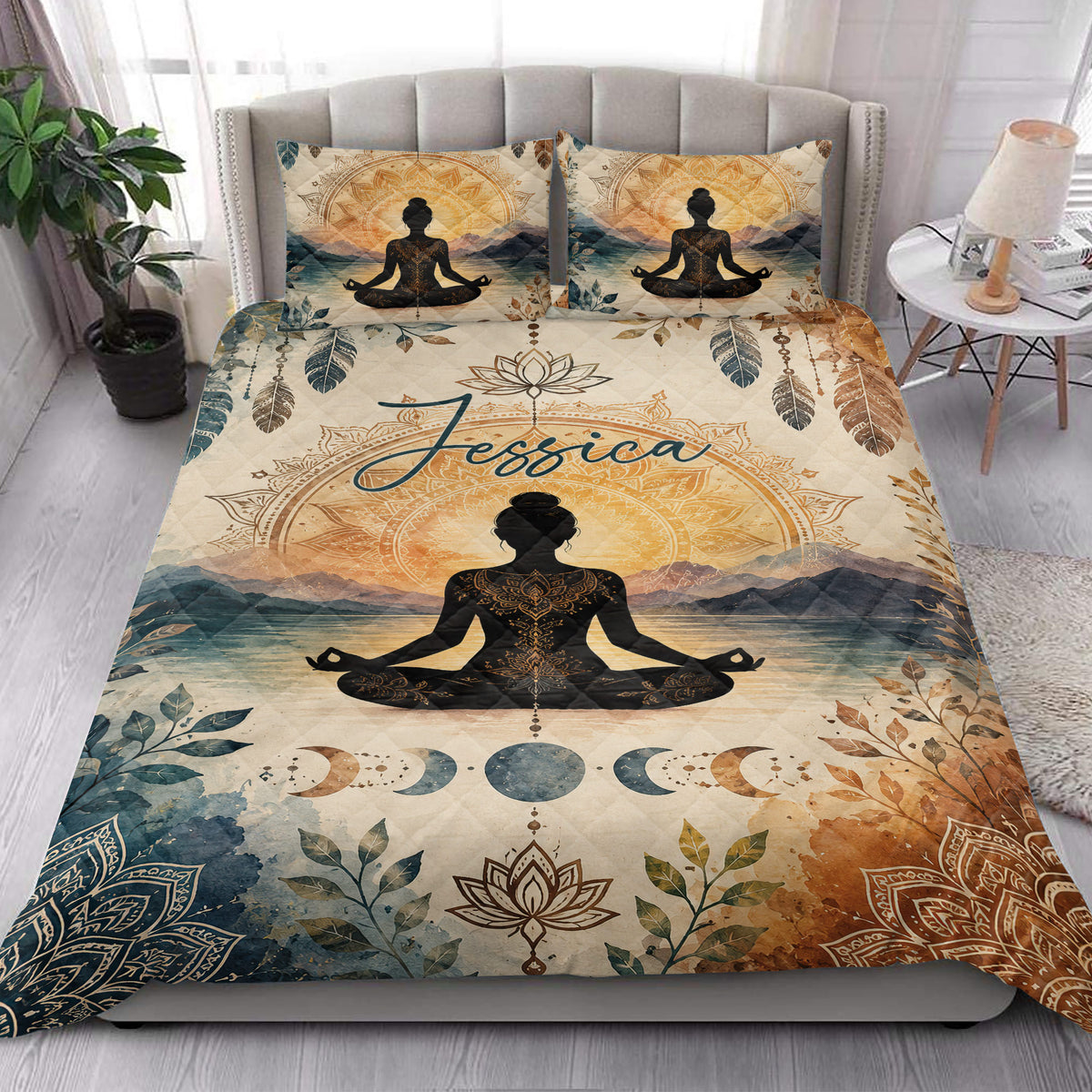 Yoga meditation quilt styled in a bright bedroom with lotus mandalas, mountain scenery, and seated figure artwork