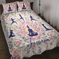 Yoga quilt bedding set displayed on a bed with purple meditation silhouettes, lotus flowers, and butterflies
