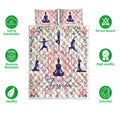 Yoga quilt blanket shown front-facing with floral meditation artwork and soft breathable bedding icons