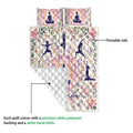 Yoga quilt blanket showing the floral printed side and white quilted backing detail