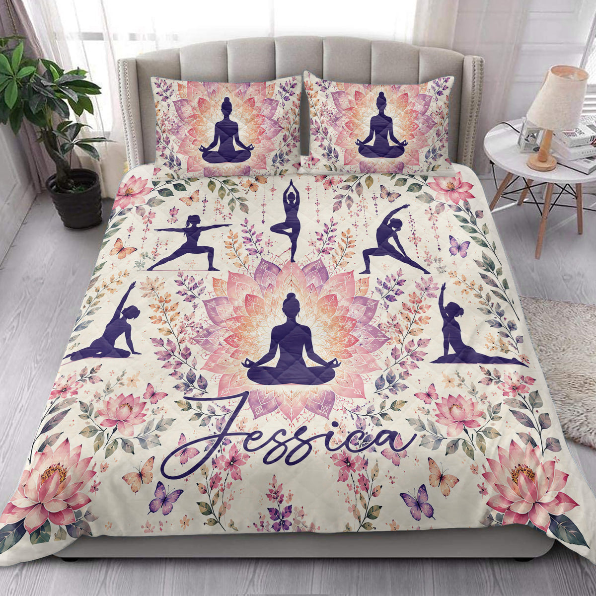 Yoga quilt bedding styled in a bright bedroom with lotus flowers, butterflies, and meditation poses