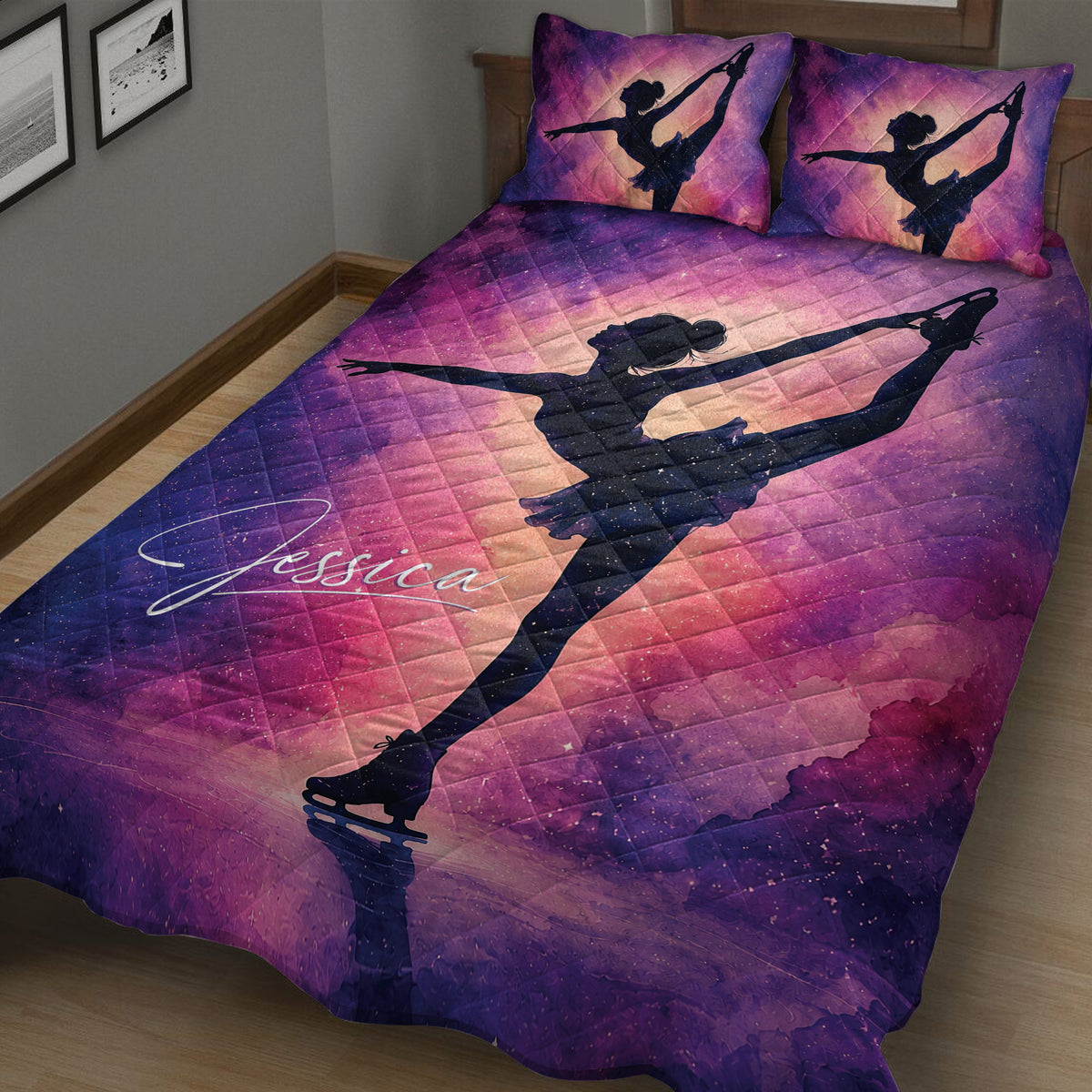Purple galaxy ice skating quilt displayed on a bed with figure skater silhouettes