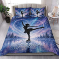 Galaxy-themed ice skating quilt bedding styled in a bright bedroom with figure skater artwork