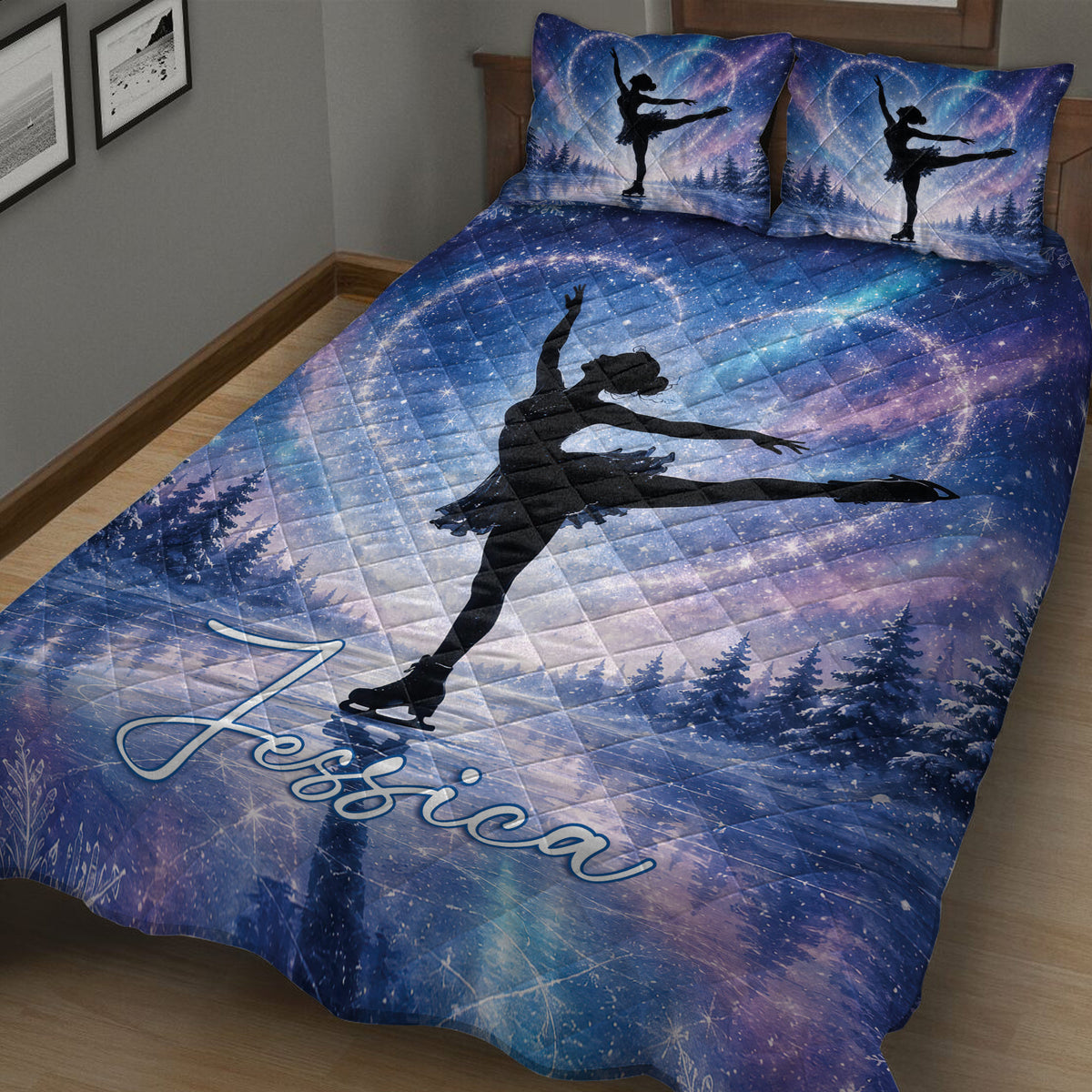 Blue ice skating quilt blanket spread across a bed with figure skater silhouettes and winter forest scenery