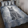 Russian Blue cat quilt blanket displayed on a bed with blue watercolor florals and paw print accents