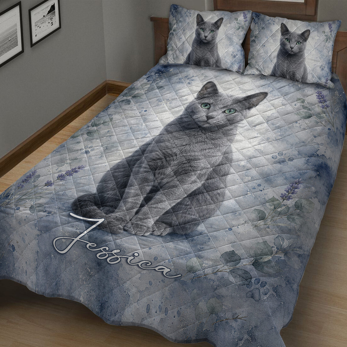 Close bedroom view of a Russian Blue cat quilt blanket with botanical accents and blue watercolor details