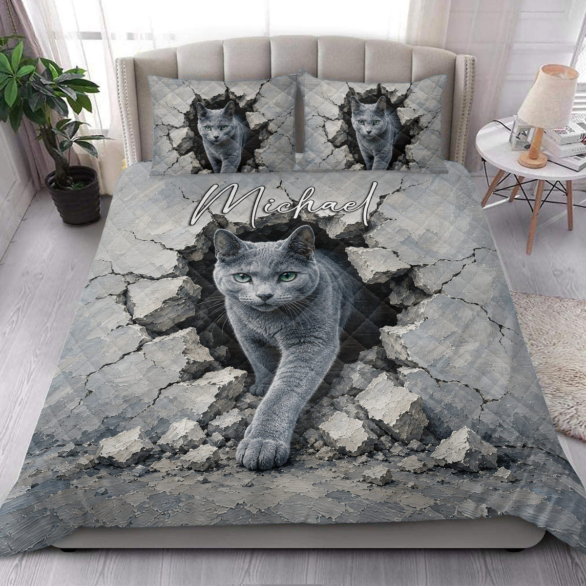 Russian Blue cat quilt bedding styled in a bright bedroom with matching pillows and gray cat artwork