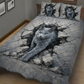 Close bedroom view of a Russian Blue cat quilt blanket with blue-gray tones and cracked stone artwork