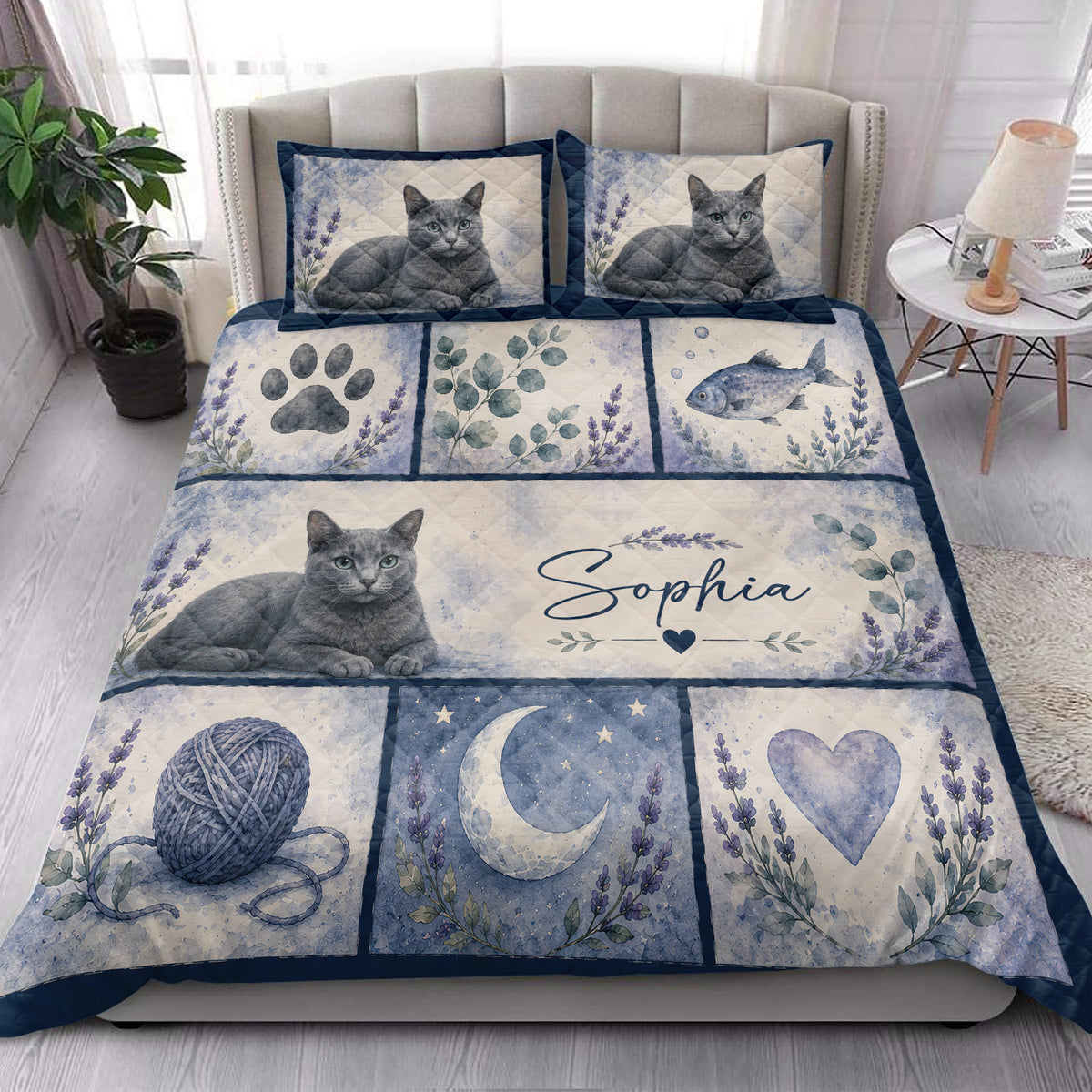 Russian Blue cat quilt blanket styled in a bright bedroom with cat portraits, flowers, paw prints, and moon panels