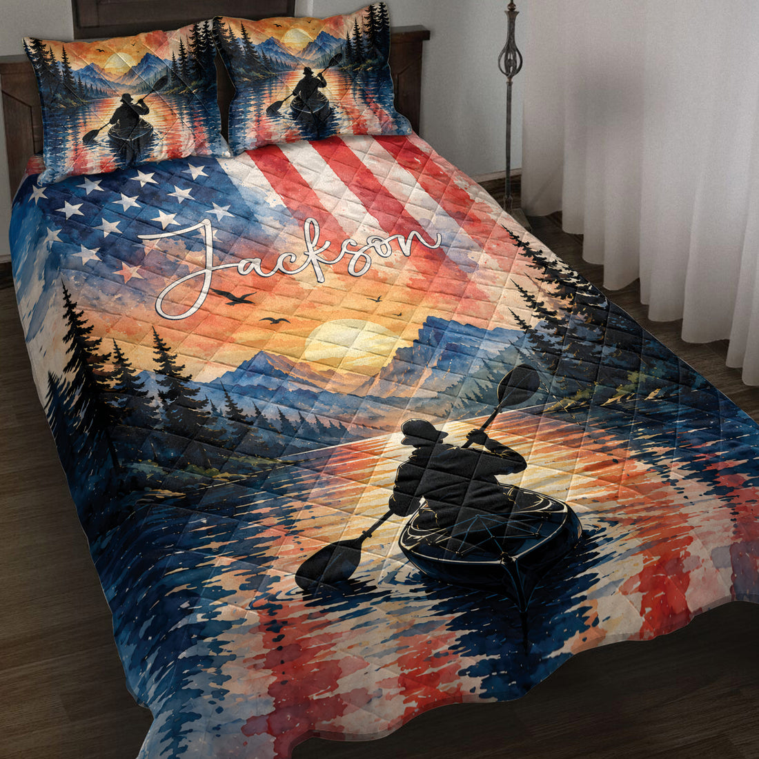 Kayak quilt blanket displayed on a bed with mountain lake artwork, patriotic colors, and paddler silhouettes